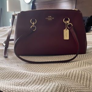 Maroon coach bag